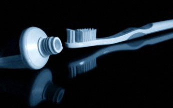 image: toothbrush and toothpaste