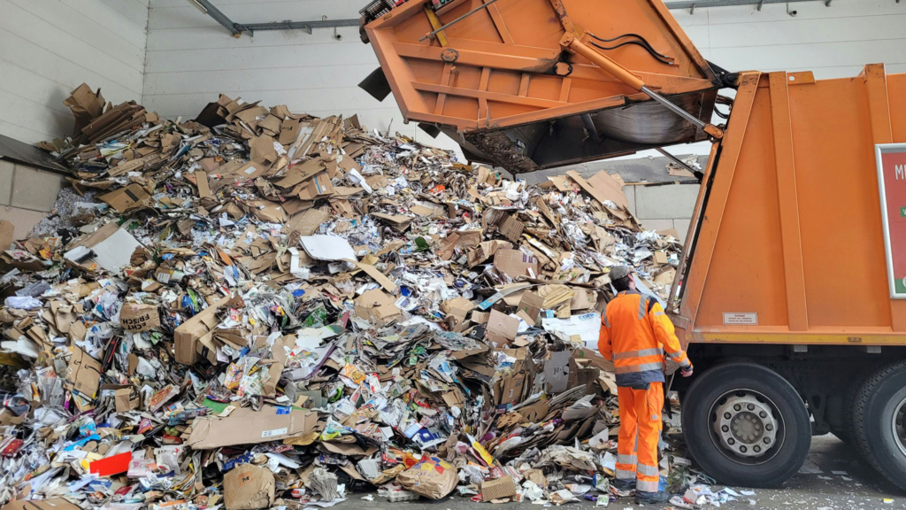 garbage truck dumping trash